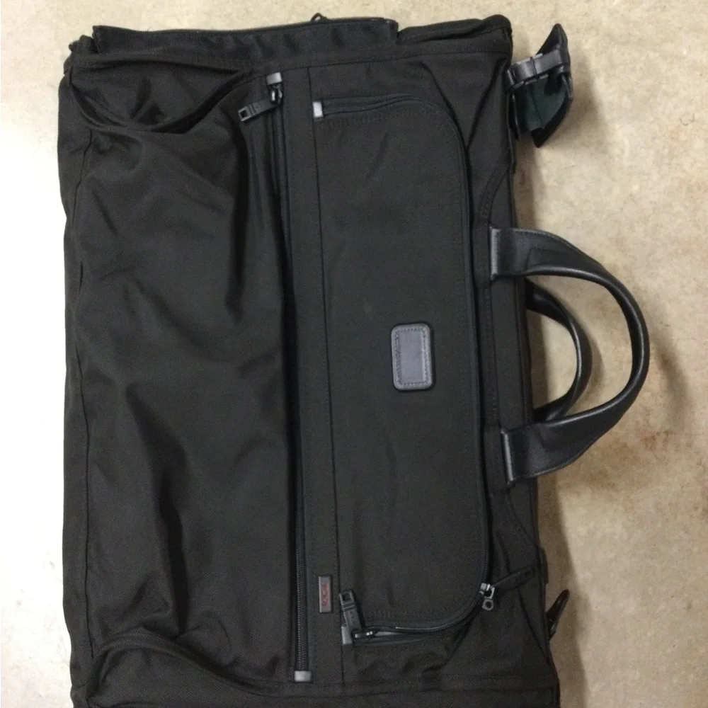 Tumi Black Men's Travel Duffel with Front Zip Pocket and Carry Handles